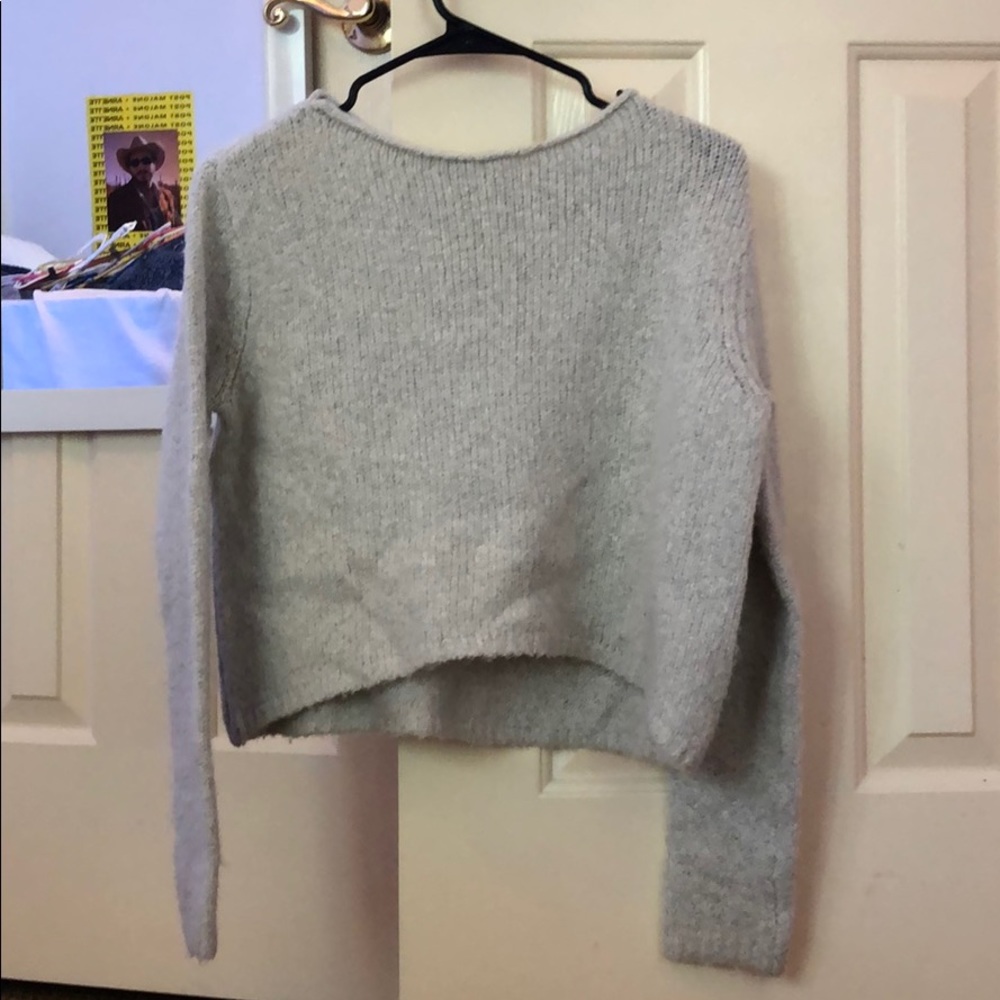 Lightly worn gray sweater